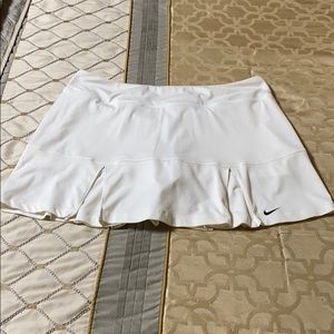 Nike white tennis 🎾 skirt with inner shorts.